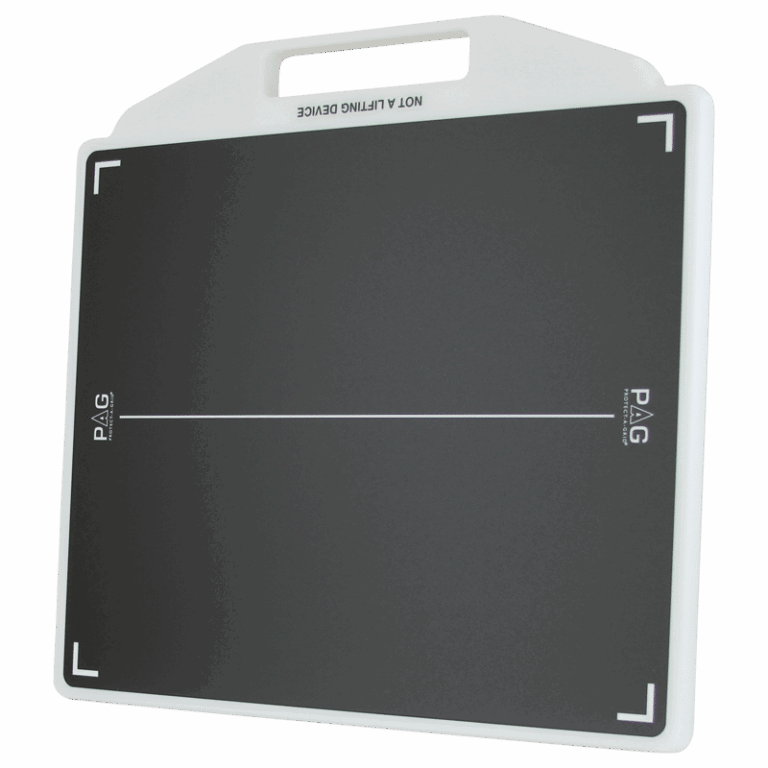 Flat black radiology positioning board with white alignment markings and a built-in handle at the top.
