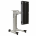 Side view of a mobile X-ray panel holder with vertical alignment markers and four caster wheels.
