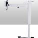 Mobile medical equipment stand with adjustable horizontal arm and wheeled base.