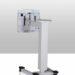 Mobile equipment stand with vertical column, wheeled base, and mounted medical device with protective cover
