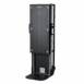 Side view of a vertical X-ray film holder with adjustable height scale, metal frame, and foot platform for upright radiographic positioning