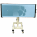 Horizontal X-ray panel mounted on mobile stand with caster wheels.