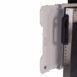 Close-up of wall-mounted transformer cabinet showing side handle and partially open white panel.