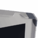 Close-up of a monitor corner with a gray protective foam guard