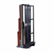 Mobile X-ray cassette holder with metal frame, wheels, and red side panel.