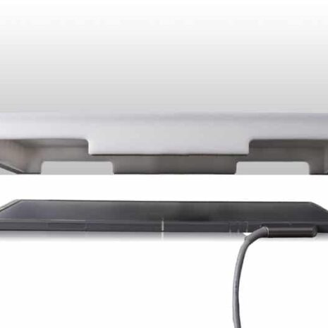 4-5 Side view of two stacked flat panels, the top with white edges and the bottom in dark gray, both connected by a cable.