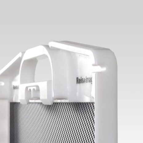 5-9 Close-up of a white frame with a built-in handle attached to a carbon-fiber imaging panel.