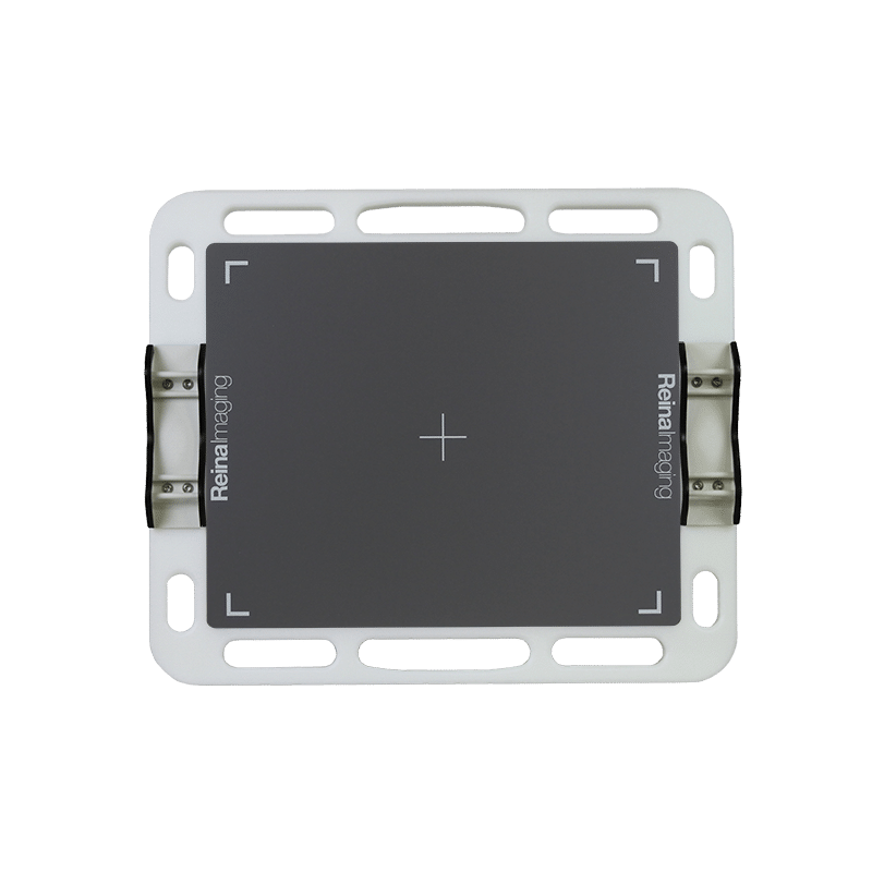 Rectangular gray imaging plate with a white frame and metal side clips, featuring a centered crosshair and corner markers.