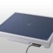 Flat rectangular panel with a dark blue surface, white edges, and a centered crosshair, featuring a connected cable.