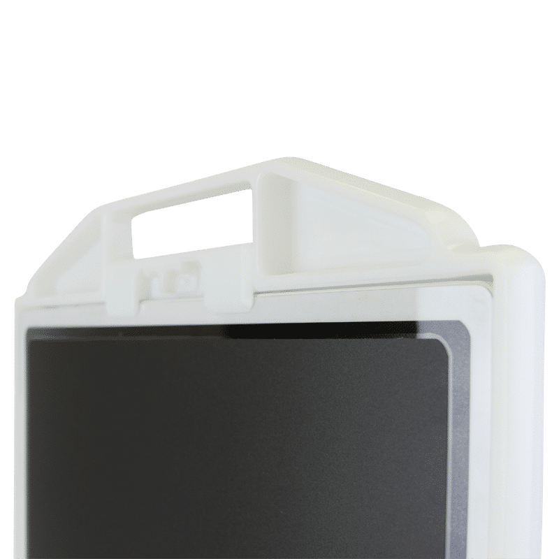 Close-up of a black flat panel detector inside a white holder with integrated handle