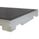 Close-up of a white plastic frame with a black panel and cut-out slots
