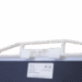 Close-up of a white locking handle on a carbon fiber X-ray grid with a PAG label and specifications