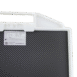 Close-up of a carbon-fiber radiographic grid with a white plastic handle and label