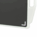 Close-up of a black X-ray grid corner with white frame and alignment marker
