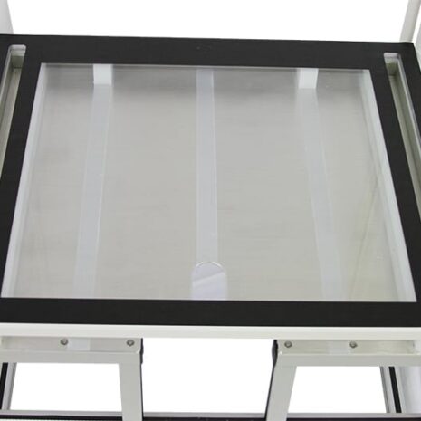 Close-Overhead Top view of a white metal frame with a black border and glass panel insert.