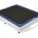 Angled view of a white rectangular panel with a black textured surface, blue border, and a handle cutout on the side