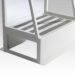 Close-up of protective shield base with textured anti-slip surface and angled supports.