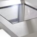 Close-up of a square glass panel set in a metallic frame