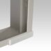 White metal frame corner with a rectangular white cap attached at the base