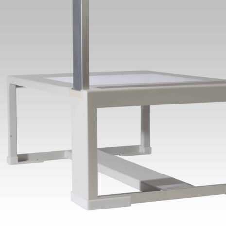 IMG_0047-scaled White metal frame with square legs and horizontal support bar, shown from below