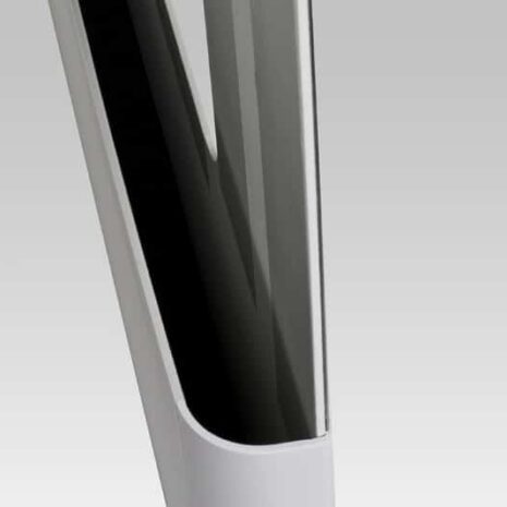 PGP-POCKET Close-up of a white wall-mounted holder with a black flat panel detector partially inserted