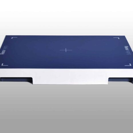 WDDR14_flat-scaled Flat rectangular imaging panel with a dark blue surface, white frame, and two open slots on the sides for handling.