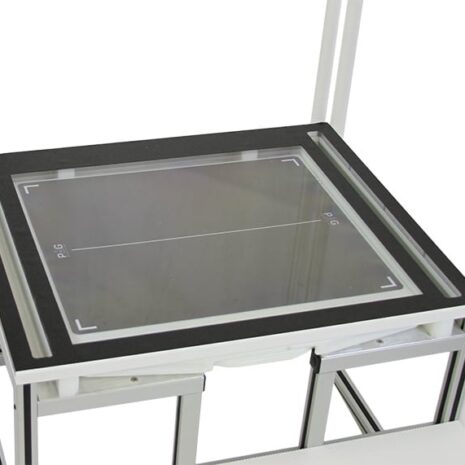 overhead-with-PAG Overhead view of a workstation with a glass panel framed in black on a white metal structure