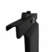 Close-up view of a black metal component with textured finish and mounting hardware.