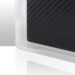 Close-up of a carbon fiber X-ray grid corner encased in a white protective frame