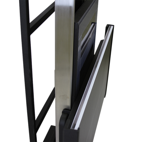 tm80i_detail_grid-1 Close-up angled view of a black metal frame with a partially extended panel and silver support bar