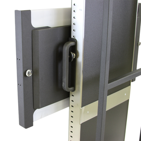 tm80i_hero_back_detail2-1 Close-up of a black metal mounting bracket with a handle attached to a vertical frame