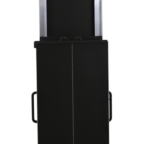 tm80i_tube1 Tall black rectangular panel with a vertical center line and side handles, positioned in front of a metallic frame with an open compartment.