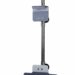 Vertical metal stand with two black spherical clamps and a flat base